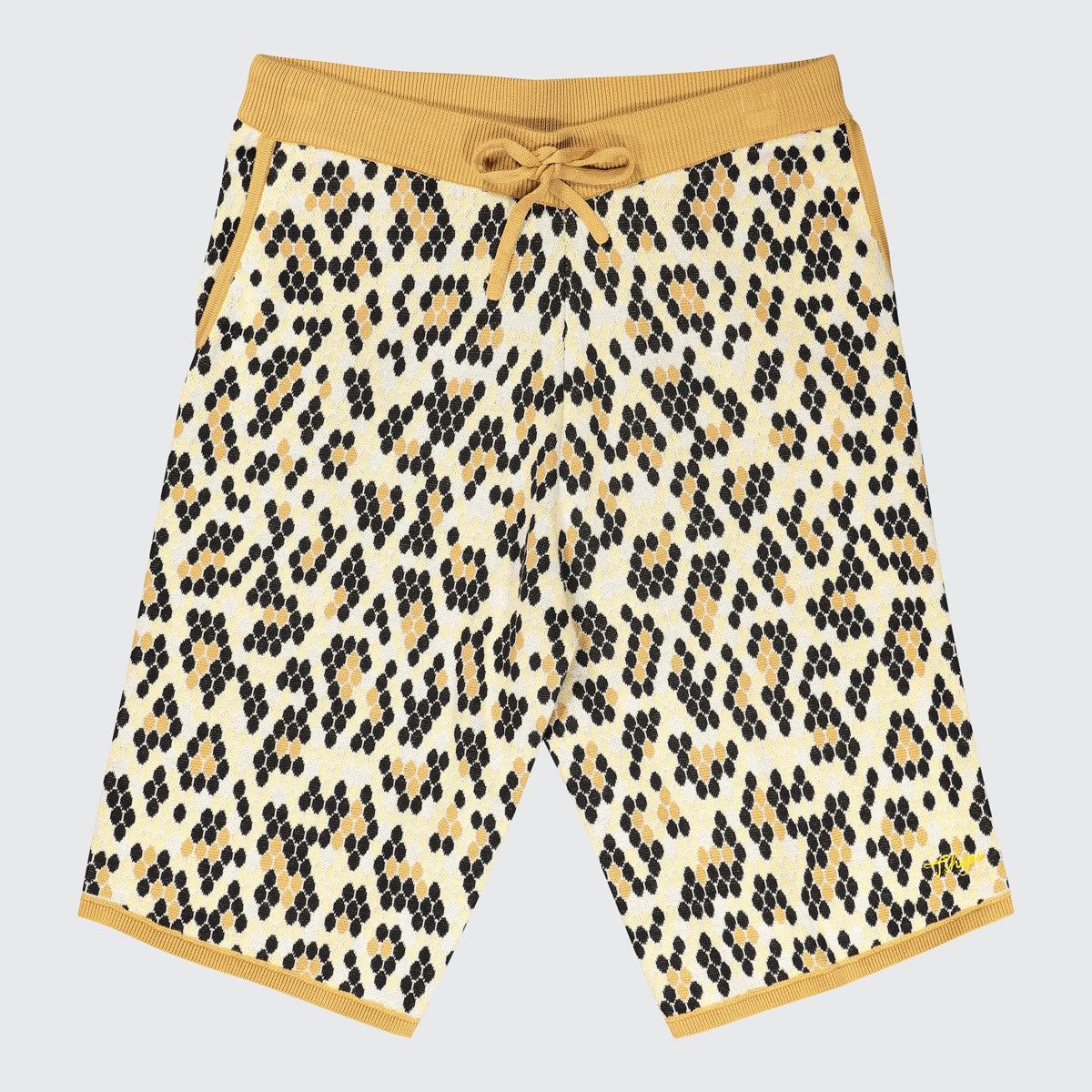 A pair of men's knitted shorts with a leopard print pattern and a beige waistband.