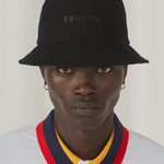 Up close image of the TSHEPO POLO with flag coloured collar.