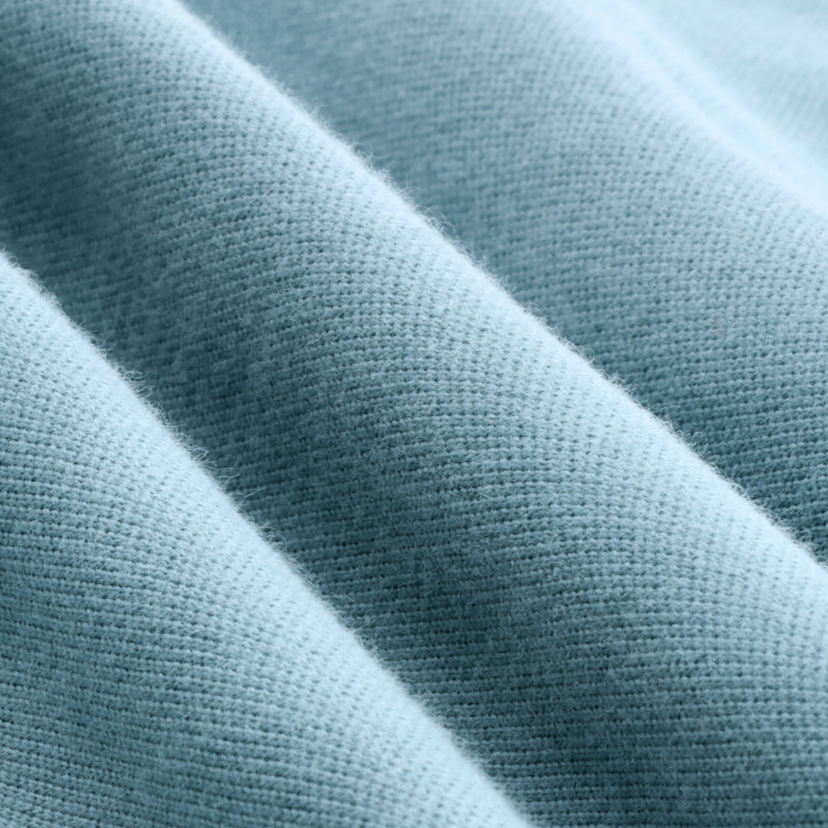 Up close detailed image of the TSHEPO Sage polo golfer