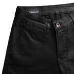 TSHEPO waxed black jeans with a revealed coin pocket.