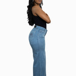 Side Profile image of a model wearing the TSHEPO Pakisha Jeans