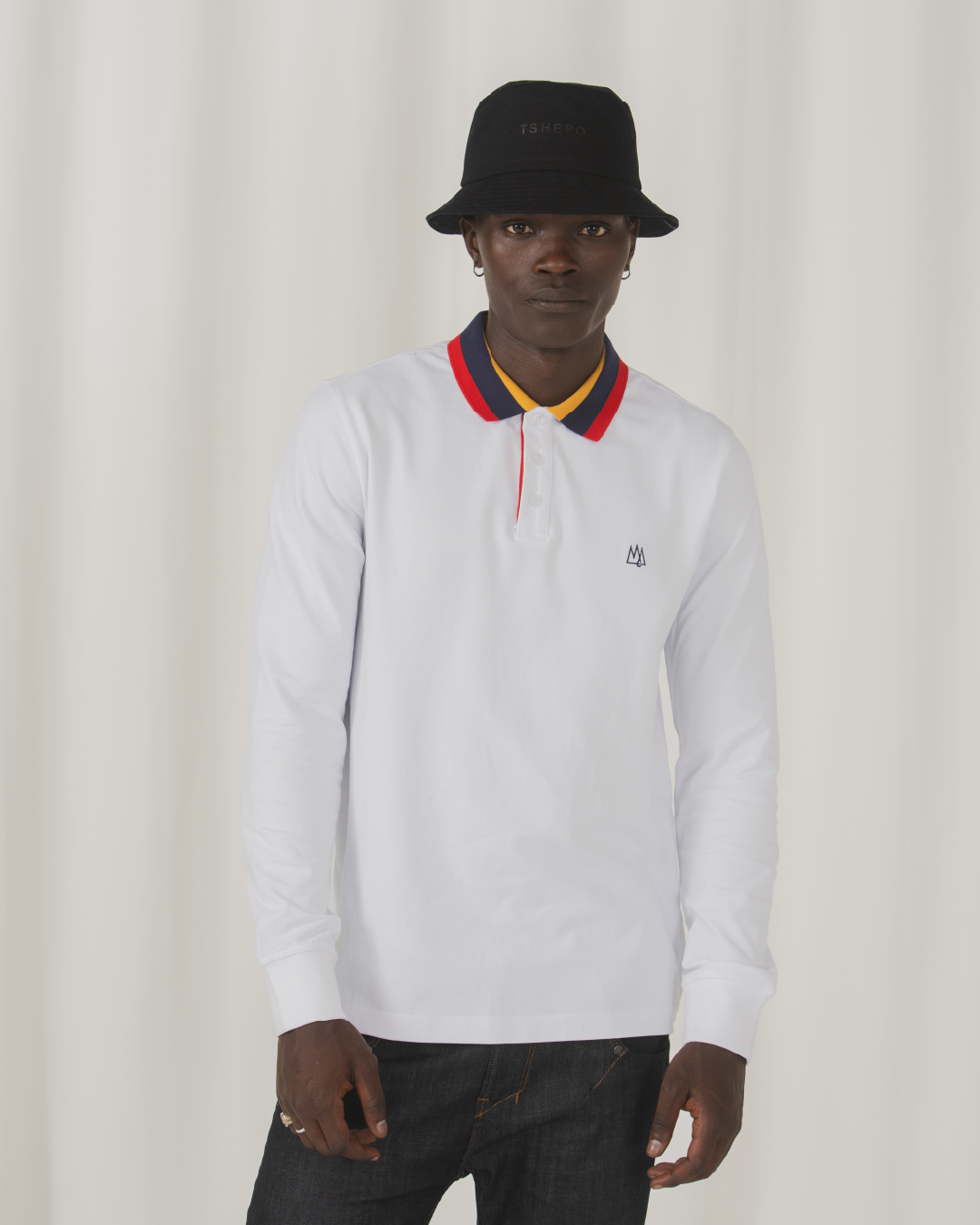TSHEPO Model in white long sleeve polo